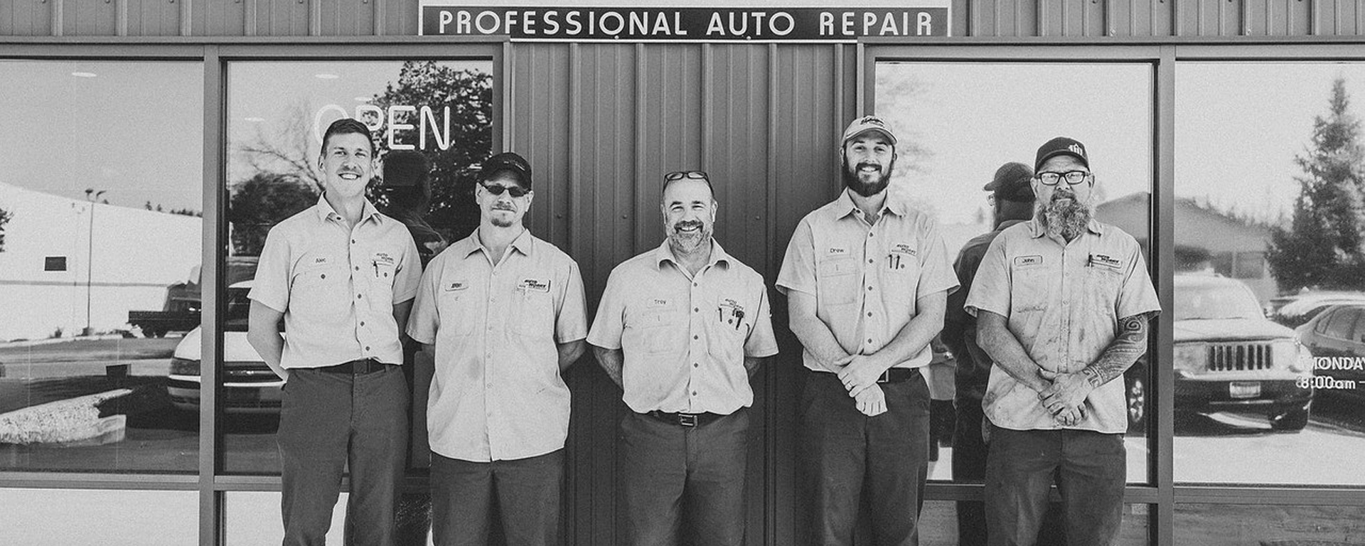 Our Team in front of our shop | AutoWorks